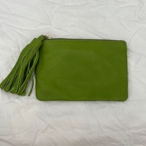 Small green leather pouch with tassel. 5 x 7 inches